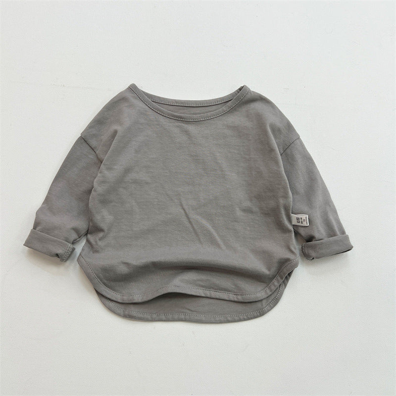 Gray long-sleeve shirt on a light gray background