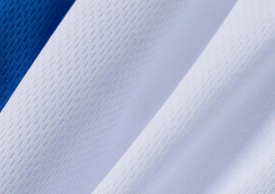 Close-up of high quality fabric with text highlighting its comfort and breathability.
