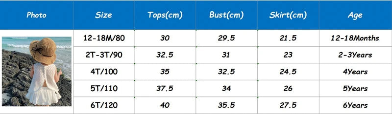 Table with clothing size chart for children, featuring a child in a dress on a beach.