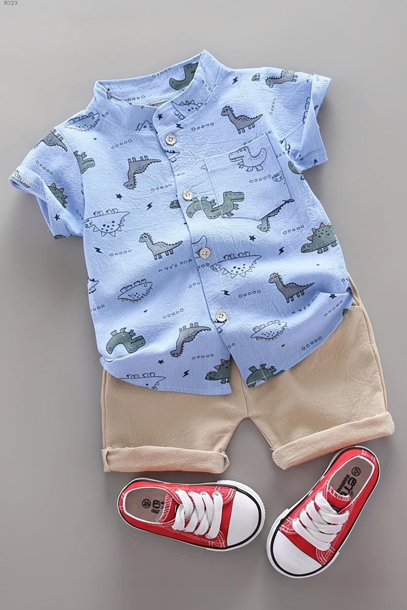 Children's outfit with blue shirt and beige shorts, paired with red sneakers on a neutral background.